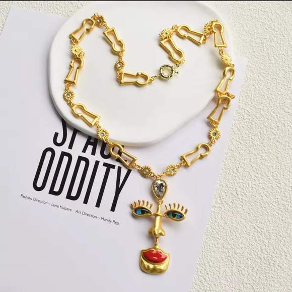 Gold and Red Artistic Face Pendant Necklace - Picture 2 of 5